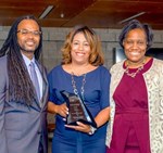 Debra Thornton-Fitzpatrick was recognized with a Contemporary Leader Award at the third annual Historical and Emerging Leaders Recognition and Reception hosted by the Black Faculty, Staff and Administrators Association (BFSAA) on April 11, 2023.  She is seen posing for a photograph with the award and her colleagues.