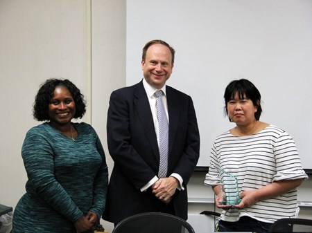 Yukari Nishizawa-Brennen, recipient of the 2022 Outstanding Faculty Advisor Award, poses for a photo with Vice Provost for Undergraduate Education & Dean of Undergraduate Studies Mark Largent and Assistant Dean for University Advising Ebony Green at Michigan State University.