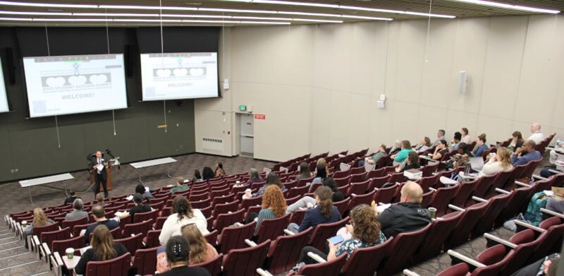 Faculty and staff listen to a presentation at the 2023 Student Success Summit on May 15, 2023 at Michigan State University.
